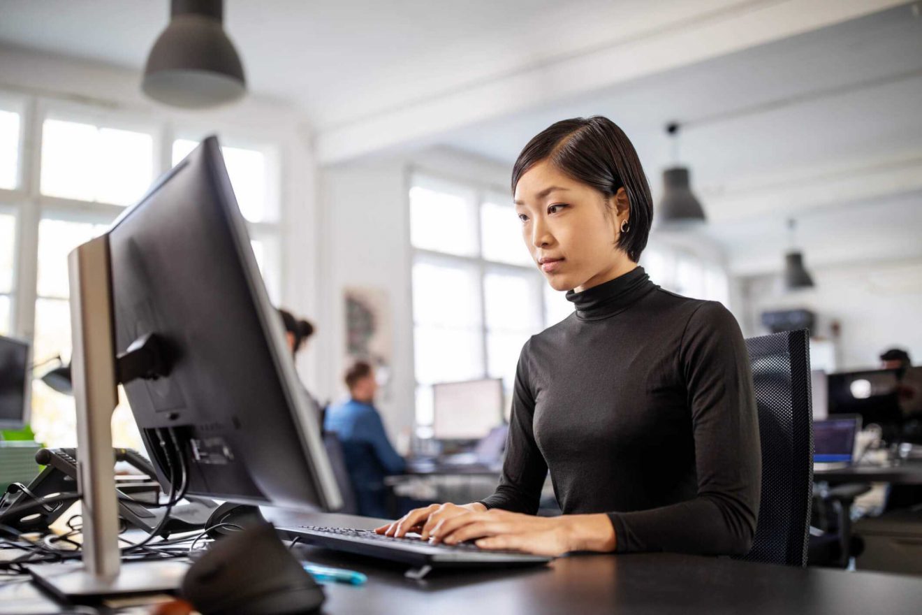 woman at computer desk