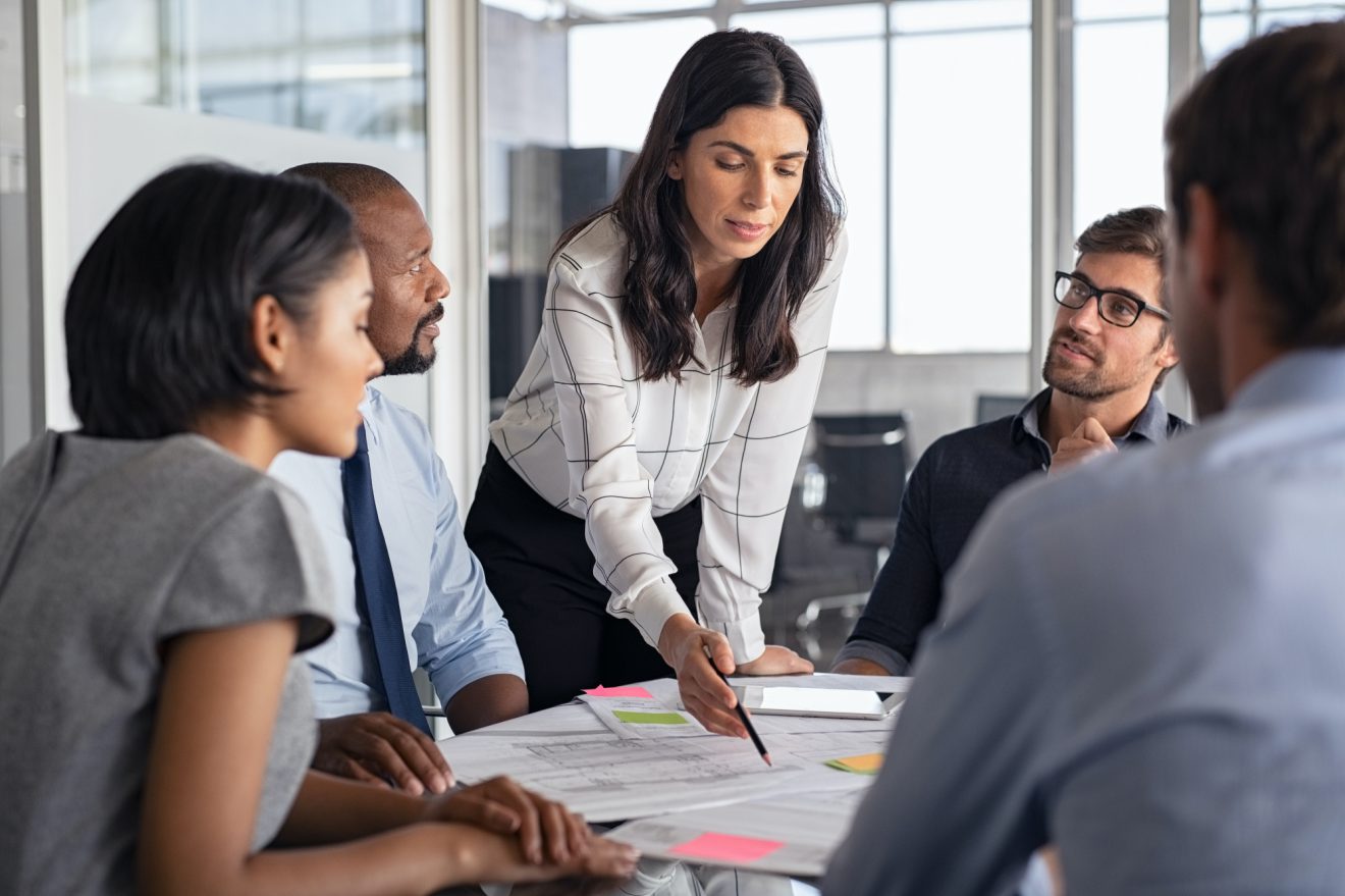 Team working together around desk